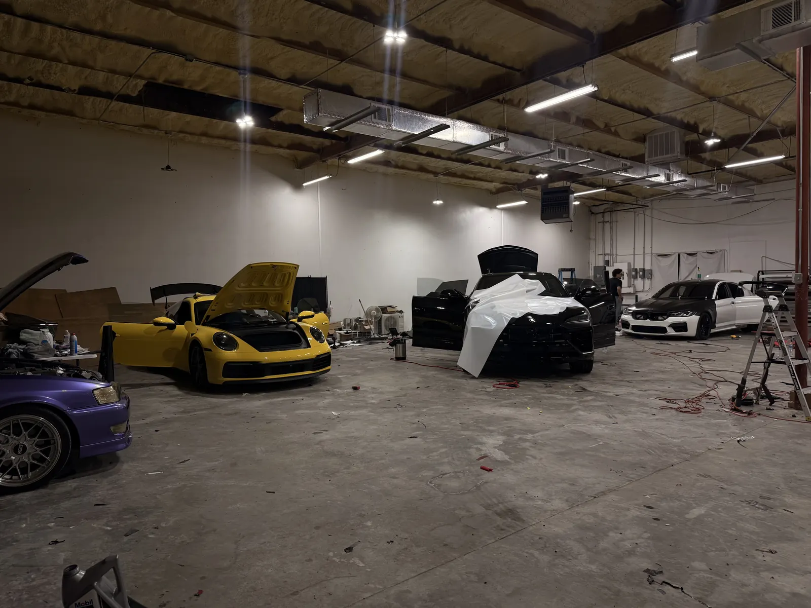The Iqballaz Customs shop floor with builds in progress