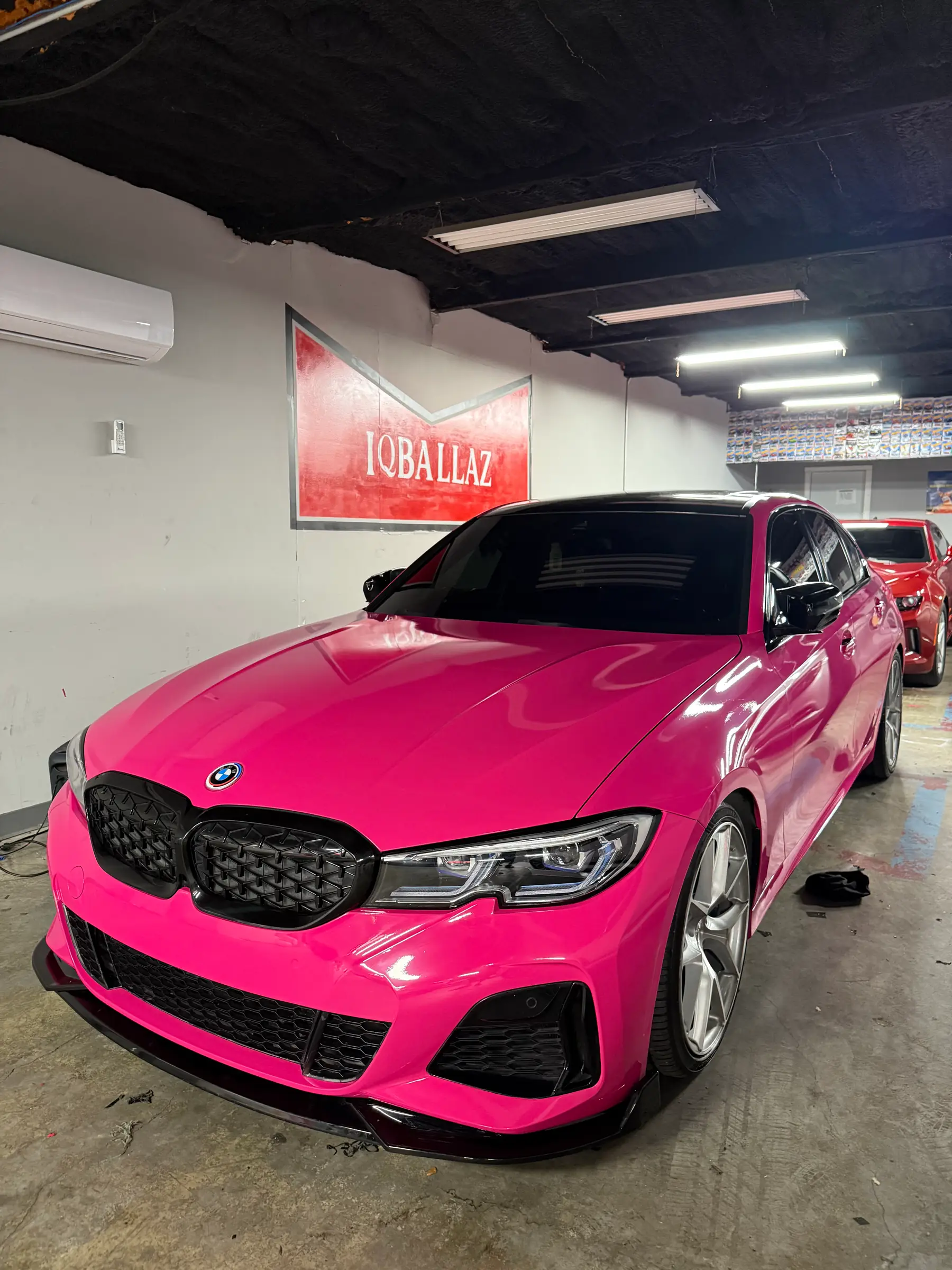 BMW M340: Magenta wrap, front three-quarter