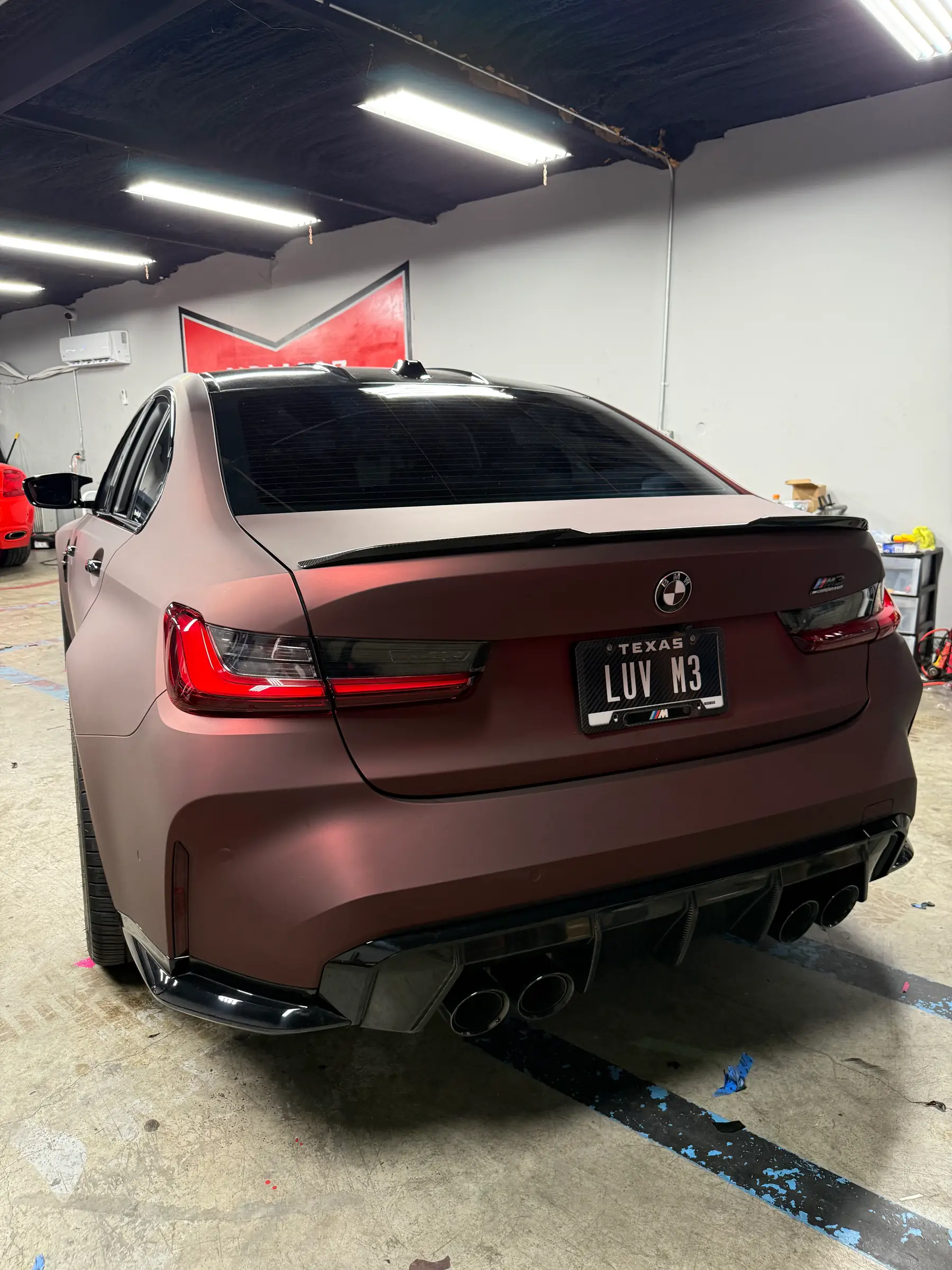 BMW M3: Deep Maroon Satin wrap, rear three-quarter