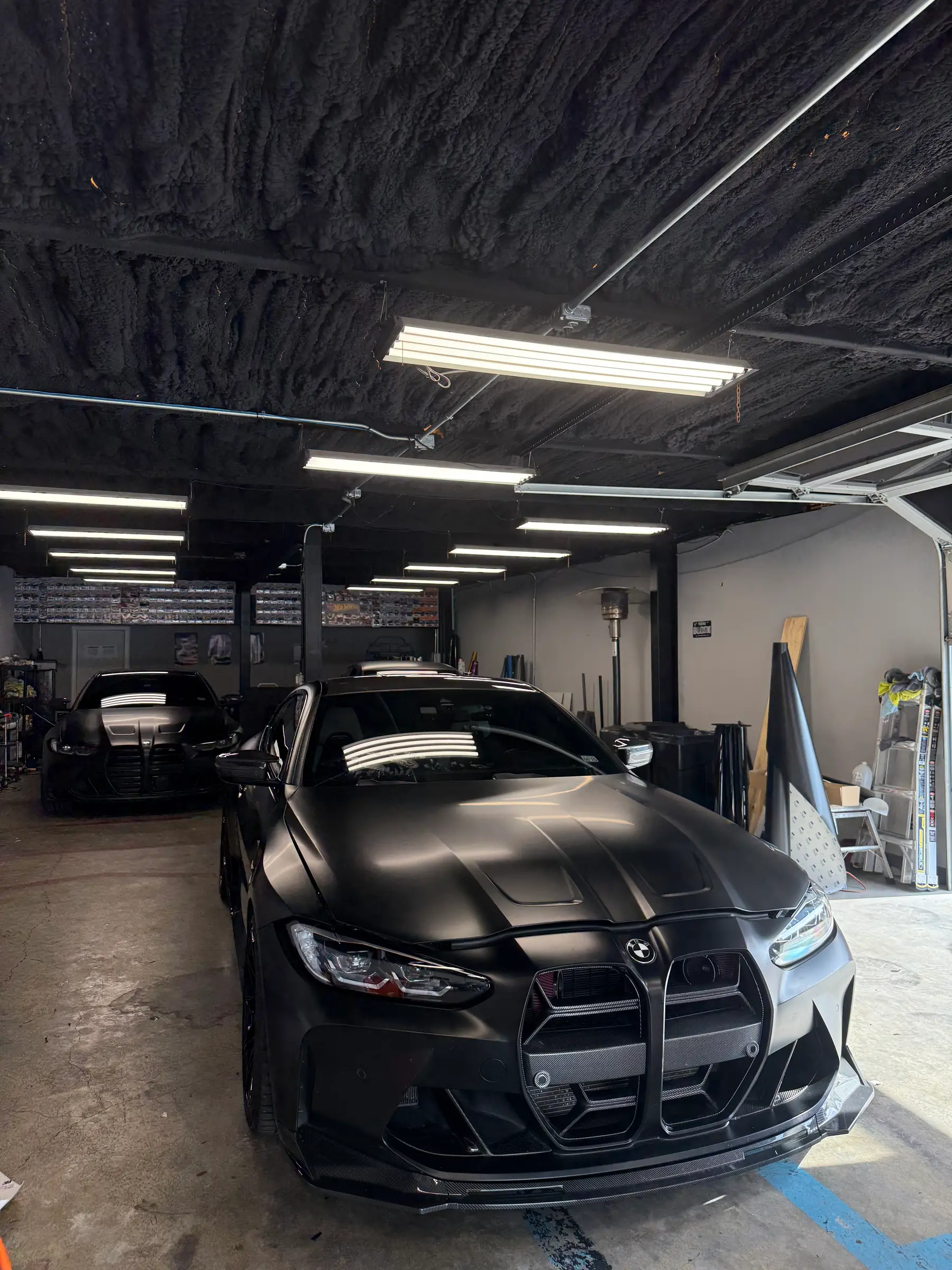 BMW M4: Matte Black wrap, front