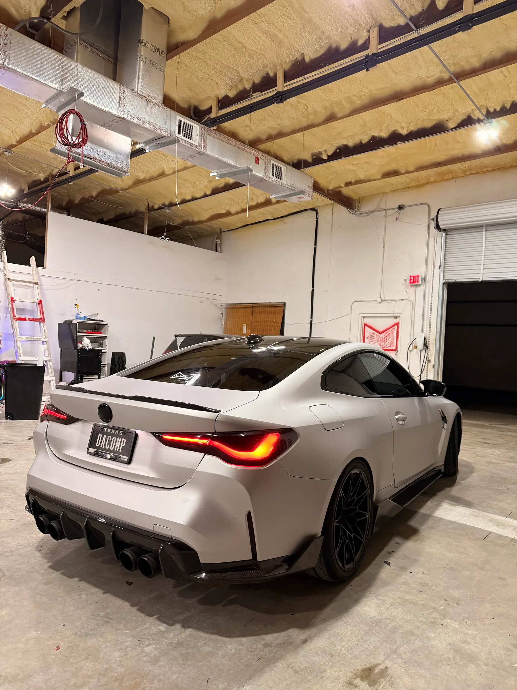 BMW M4 Competition: Alpine White wrap, front three-quarter