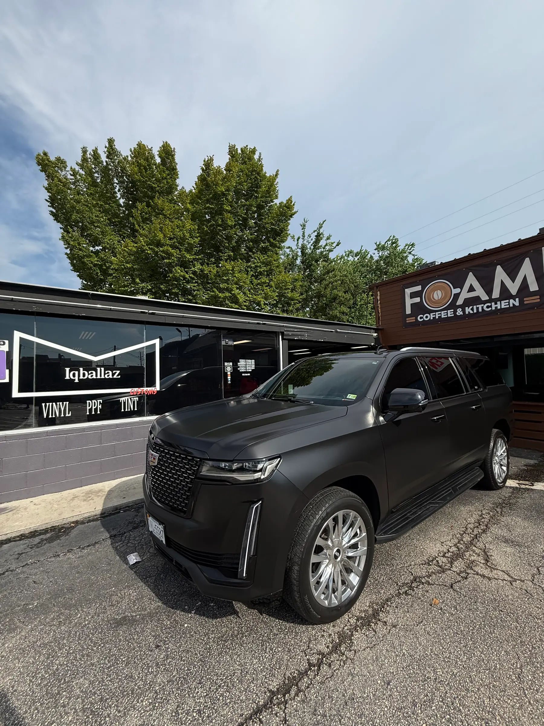 Cadillac Escalade: Matte Black wrap, front